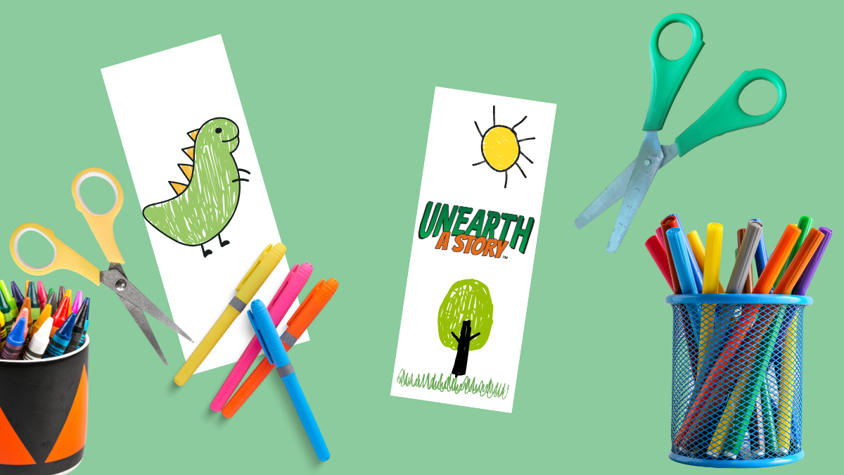 Craft supplies and hand drawn bookmarks, one saying "unearth a story"