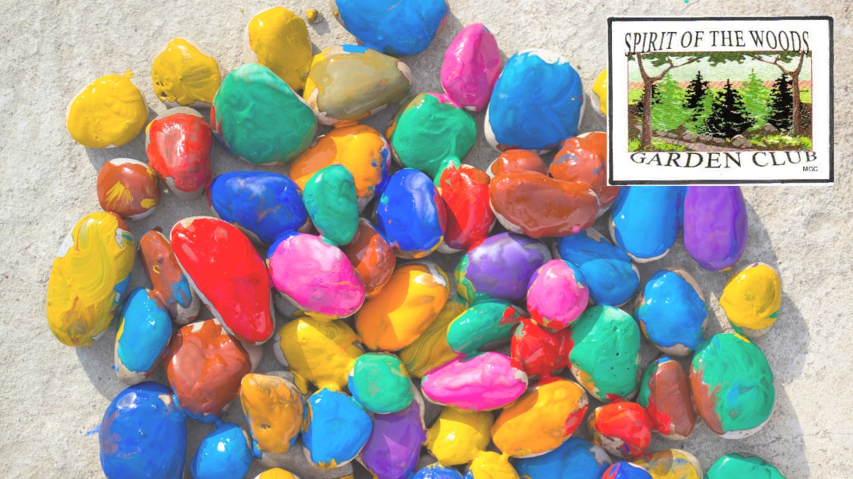 Various colors of painted rocks. Spirit of the Woods Garden Club Logo