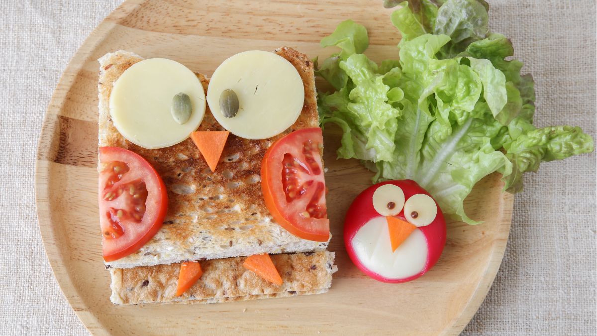 silly bird made out of sandwich and vegetables