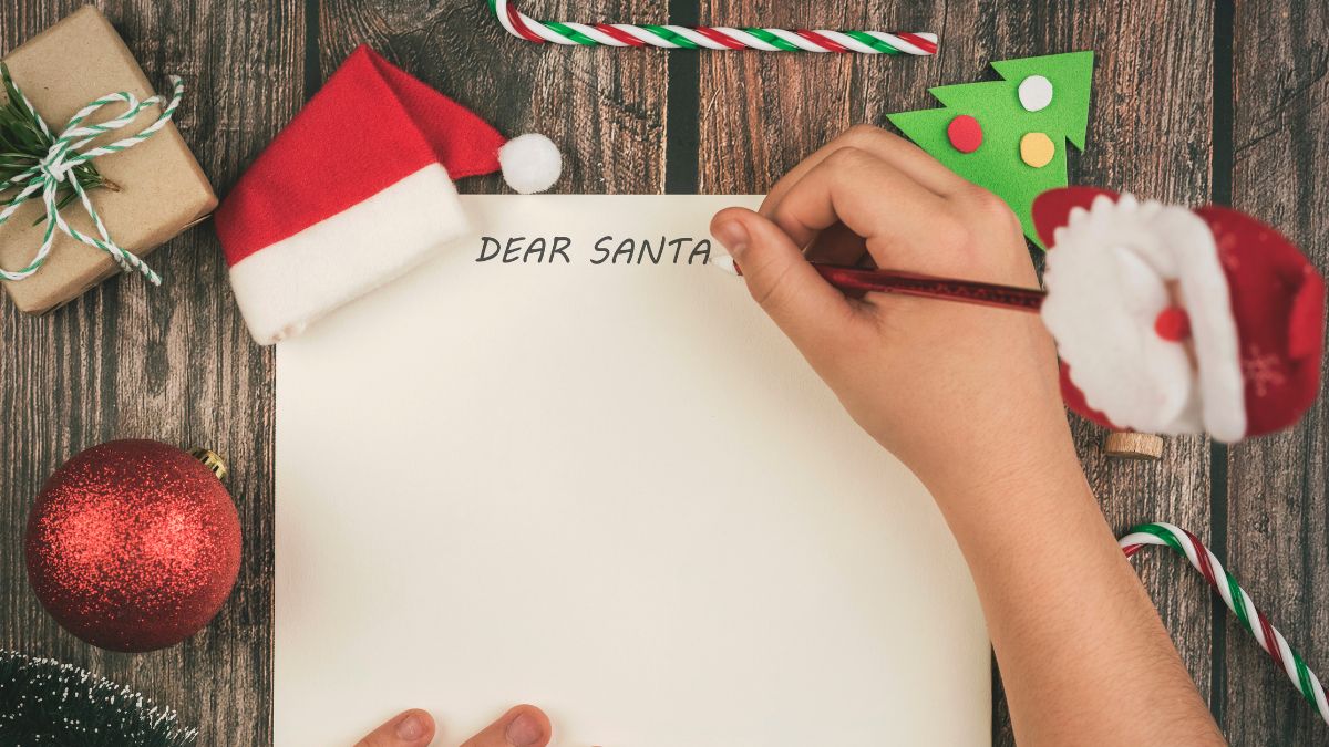 Letter being written "Dear Santa"