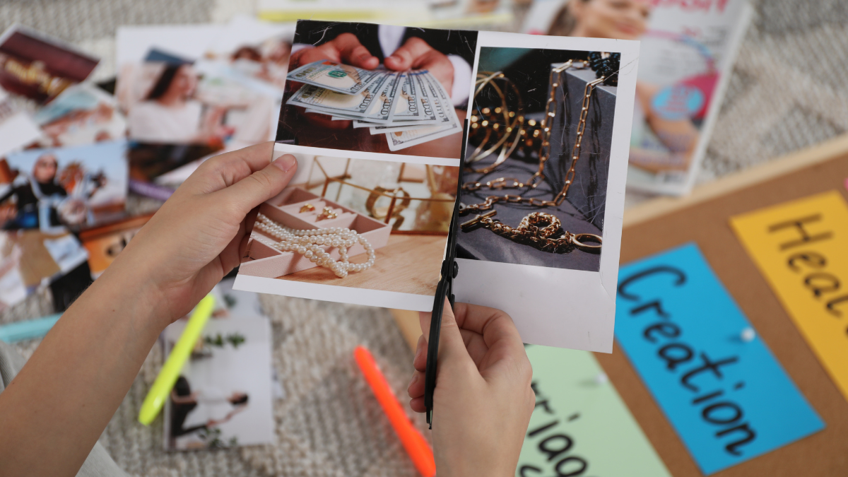 Magazine cuttings being glued to board