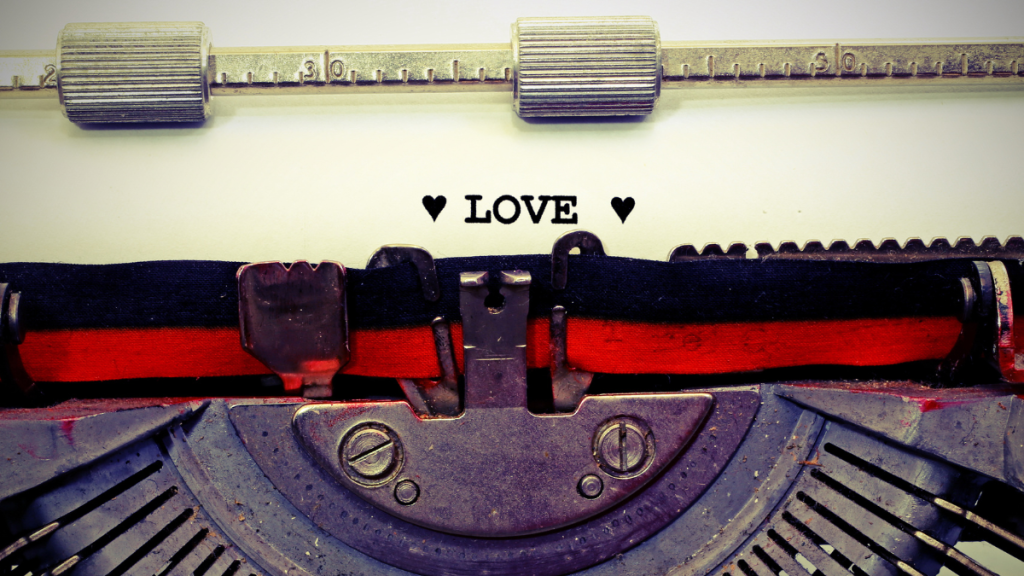 "love" typed out on paper with typewriter