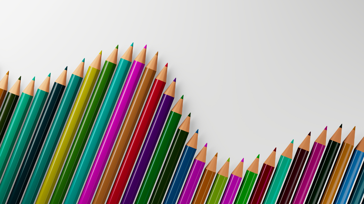 colored pencils lined up to create a wave