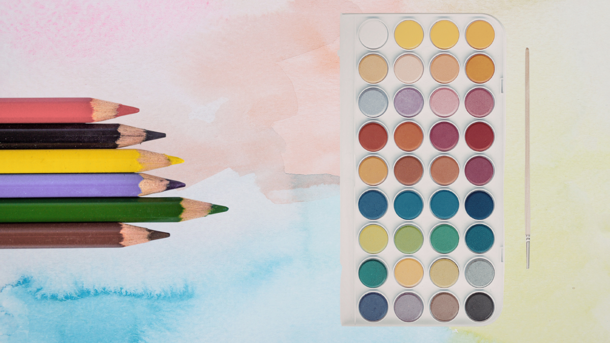 colored pencils, water color background, set of watercolor paints
