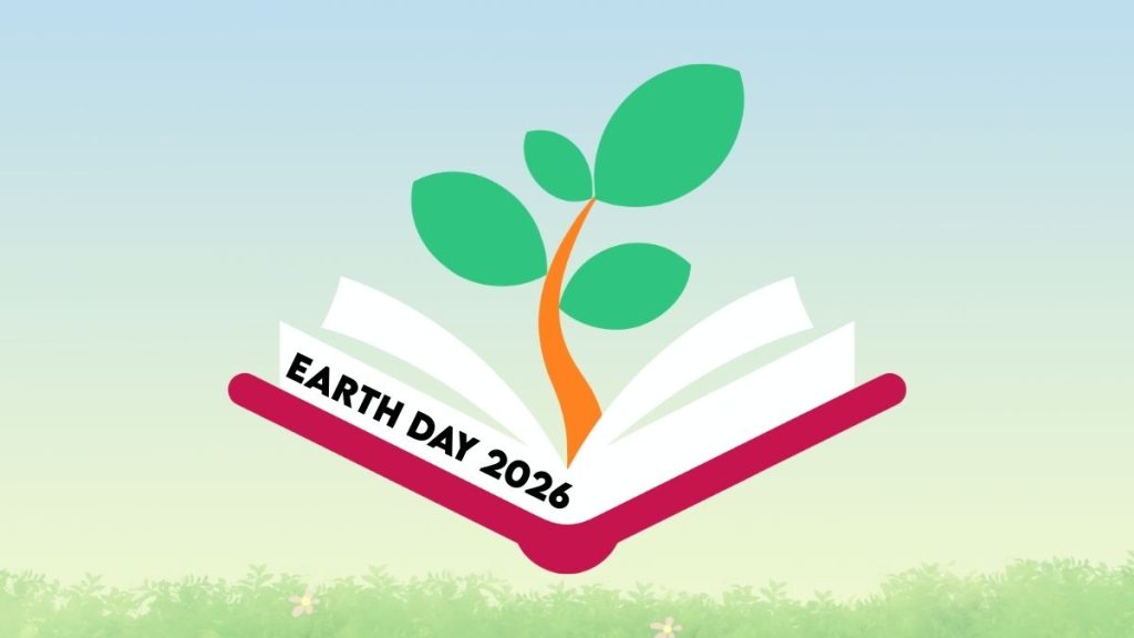 Earth Day 2026 on an open book with a tree sapling growing out of the pages